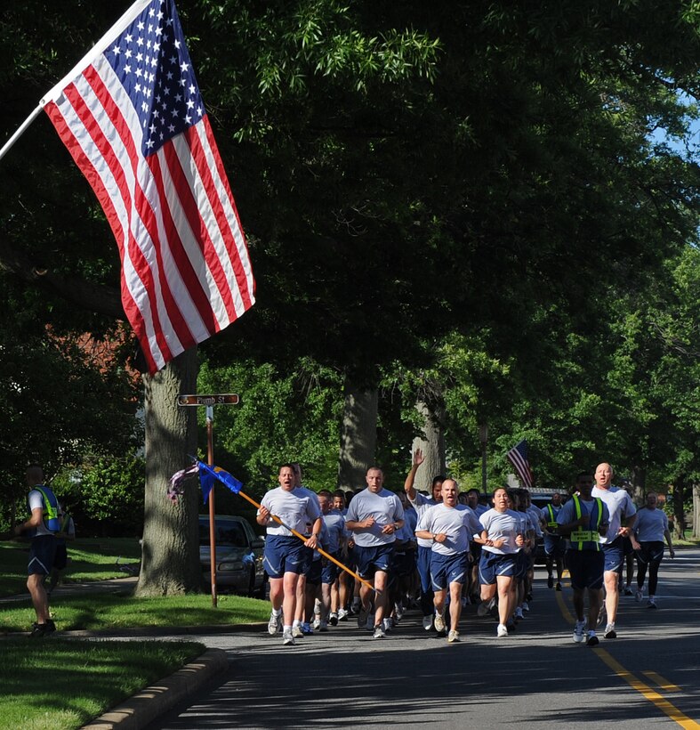 LANGLEY AIR FORCE BASE, Va. -- Members of the 1st Security Forces Squadron run down Sweeny boulevard May 21.  This was one of the runs 1SFS completes annually.  (U.S. Air Force photo/Senior Airman Zachary Wolf)