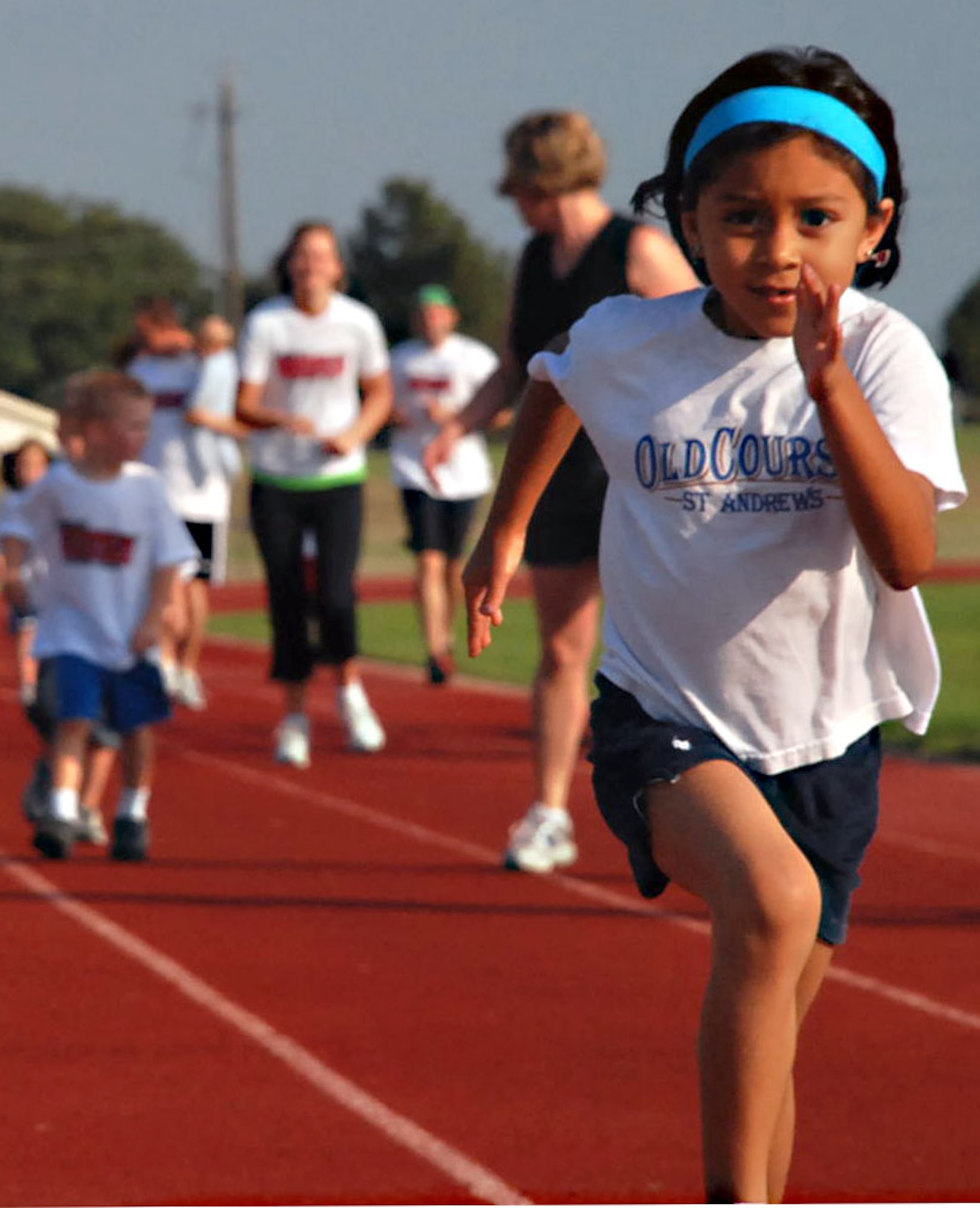 LAUGHLIN AIR FORCE BASE, Texas -- Laughlin children take off running on the track here as part of the Annual Armed Forces Kids Run May 16. Children ages 5-years-old and up and their parents were invited to run different distances on the track or around the base as part of Armed Forces Day. Armed forces Day was established in 1949 as a way for citizens to join together as thank our military members for their service. (U.S. Air Force photo by Airman 1st Class Sara Csurilla)