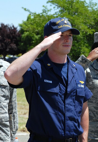 Petty Officer 2nd Class Alexander Kickham, an Avionic Technician from U.S. Coast Guard Station San Francisco renders a salute during a formation at Airman Leadership School. Petty Officer Kickham was the first non-Air Force student to graduate from Beale’s ALS. (Photo by Senior Airman Jessica Condit) 
