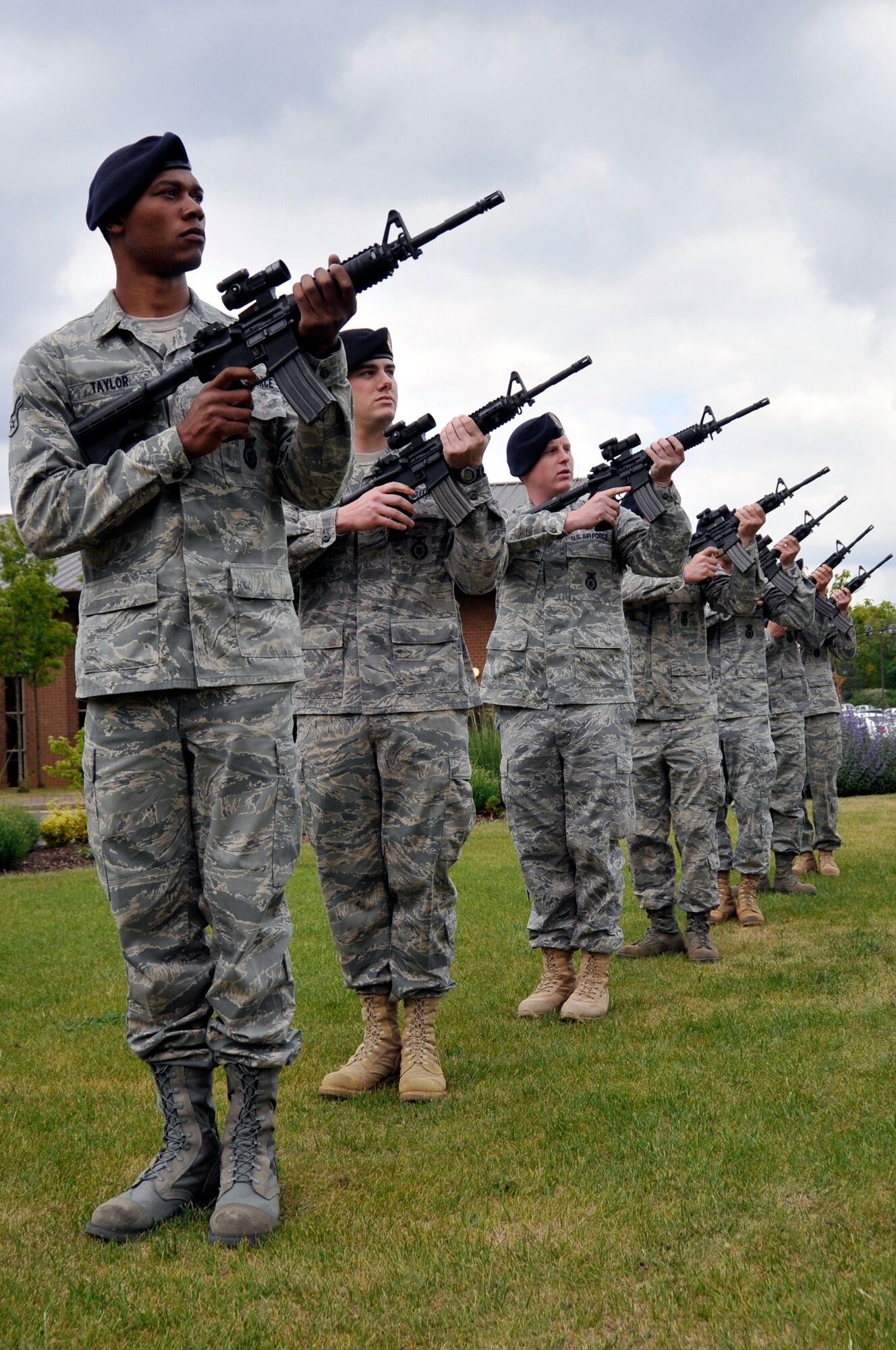 Airmen form the 48th Security Forces Squadron fire a three-volley salute May 15, 2009 at Royal Air Force Lakenheath, England as part of a closing ceremony for National Police Week May 11 to 15. (U.S. Air Force photo by Airman 1st Class Perry Aston)