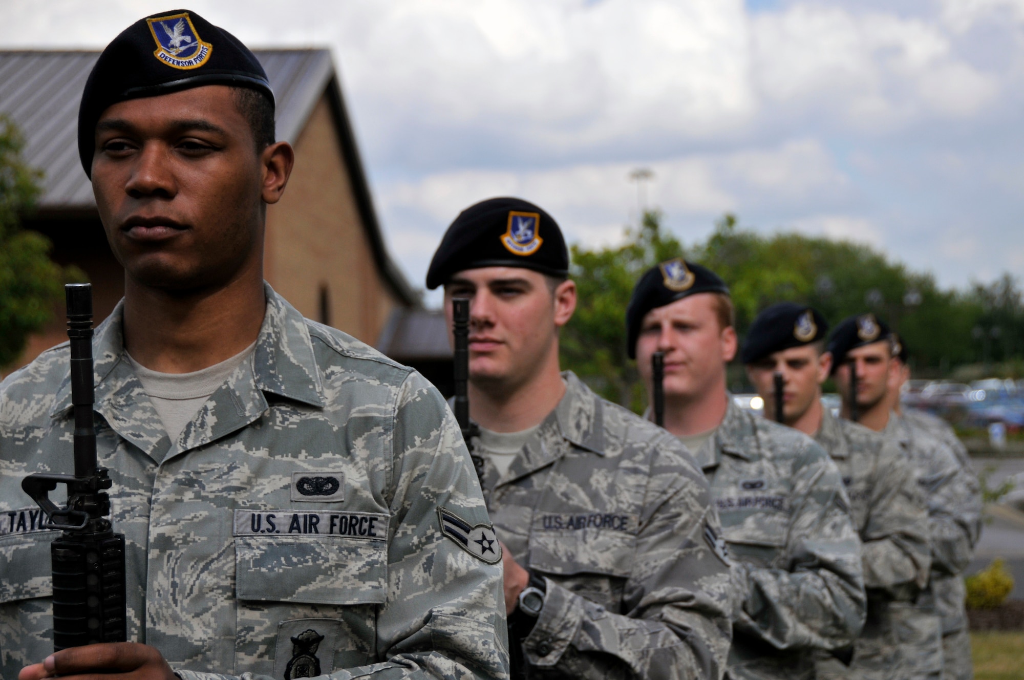 48th Security Forces Squadron Airmen perform a three-volley salute May 15, 2009 at Royal Air Force Lakenheath, England in honor of National Police Week.(U.S. Air Force photo by Airman 1st Class Perry Aston) 