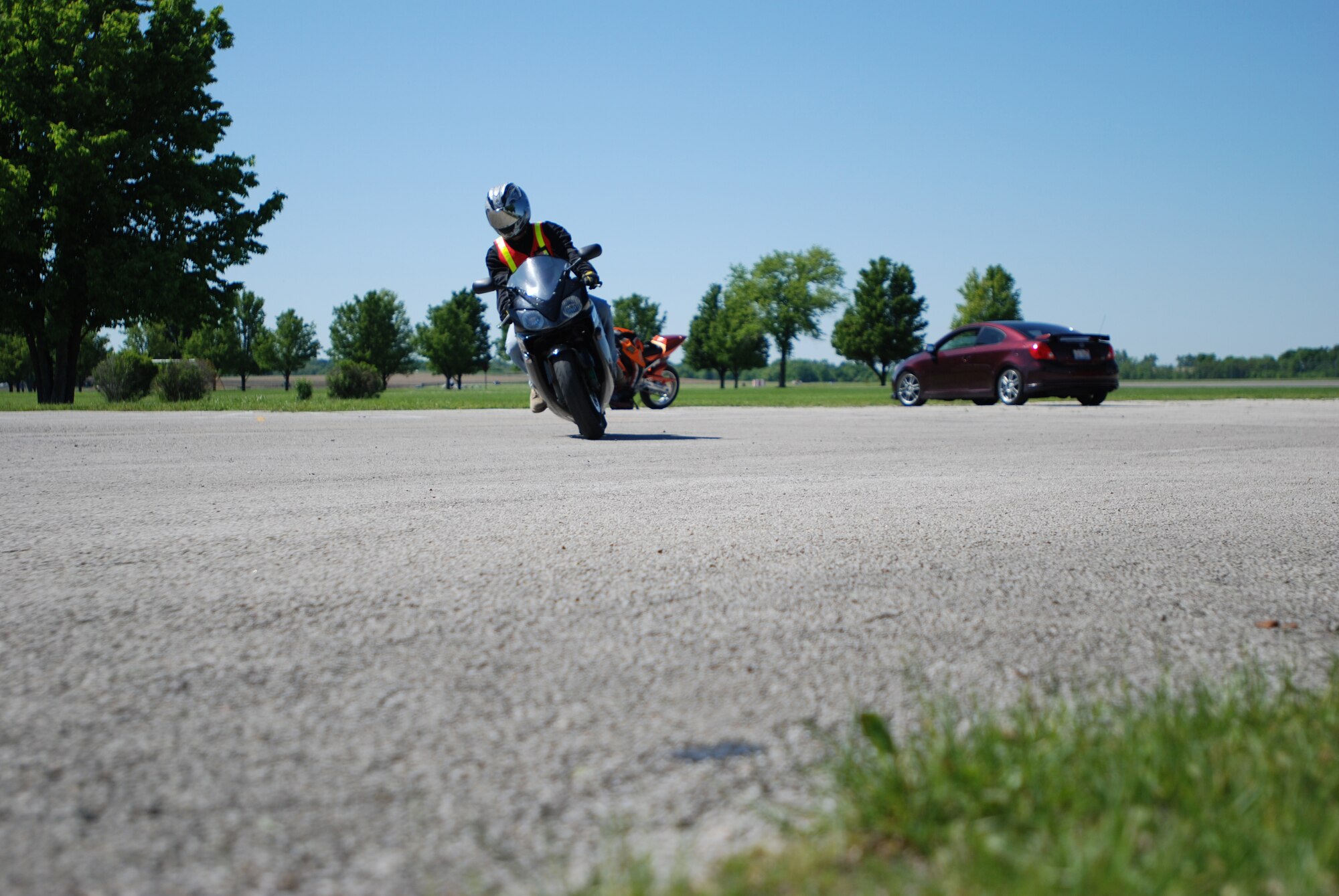 Airman Steven Reed, 375th Civil Engineer Squadron,  participates in the AMC Sport Bike Safety course at Scott Air Force Base, Ill., on May 19, 2009, just in time for the AMC Critical Days of Summer campaign.