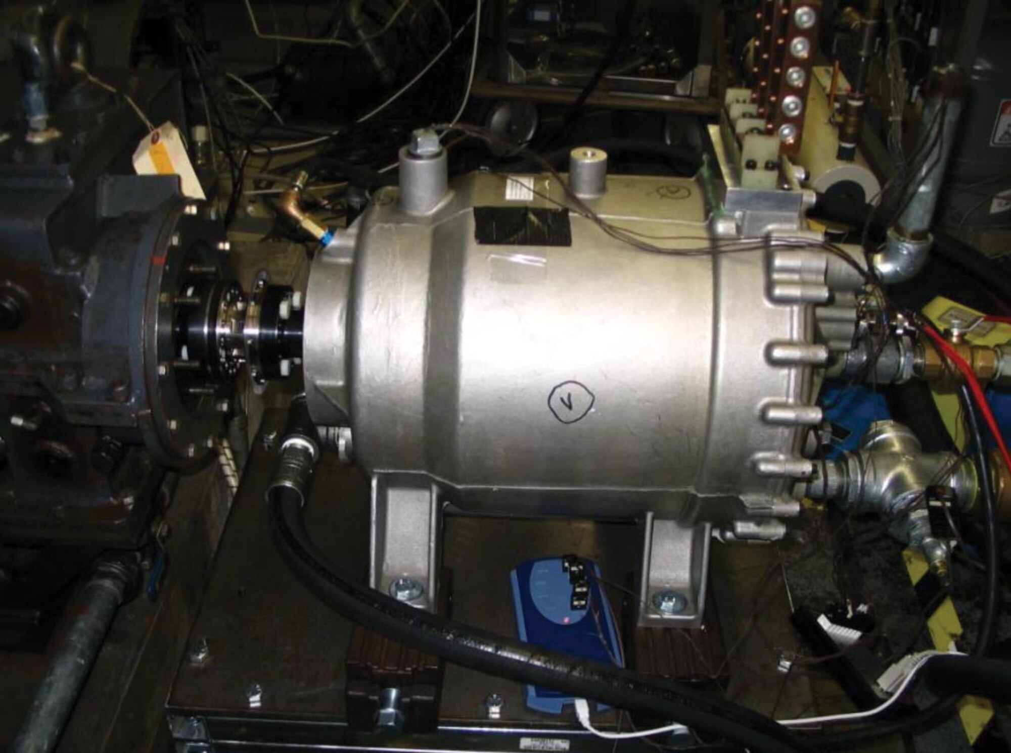 AFRL researchers successfully completed a testing experiment with a 2.5 megawatt generator.  The power dense generator of 360 lbs was developed at Electrodynamics Associates as part of the Small Business Innovation Research program to develop a generator for the unique requirements of a directed energy weapon system including high power and relatively low  duty cycle. (Air Force photo)
