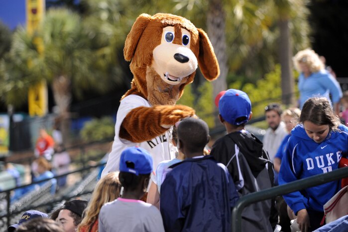Charlie T. RiverDog interacts with children during the Charleston RiverDogs baseball game at Joseph P. Riley Jr., Park May 20. The RiverDogs held a military appreciation night, which was free for all military and Department of Defense ID cardholders and their families. Charlie is the mascot for the Charleston RiverDogs and has helped the team to become one of the most popular attractions in the Lowcountry. (U.S. Air Force photo/Staff Sgt. Marie Cassetty)
