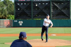 Col. John Wood throws out the first pitch at the start of the Charleston RiverDogs baseball game at Joseph P. Riley Jr., Park May 20. The RiverDogs Committee traditionally holds two military appreciation nights during the year with the first one being in May in support of Military Appreciation Month and the second in August. Colonel Wood is the 437th Airlift Wing commander. (U.S. Air Force photo/Staff Sgt. Marie Cassetty)