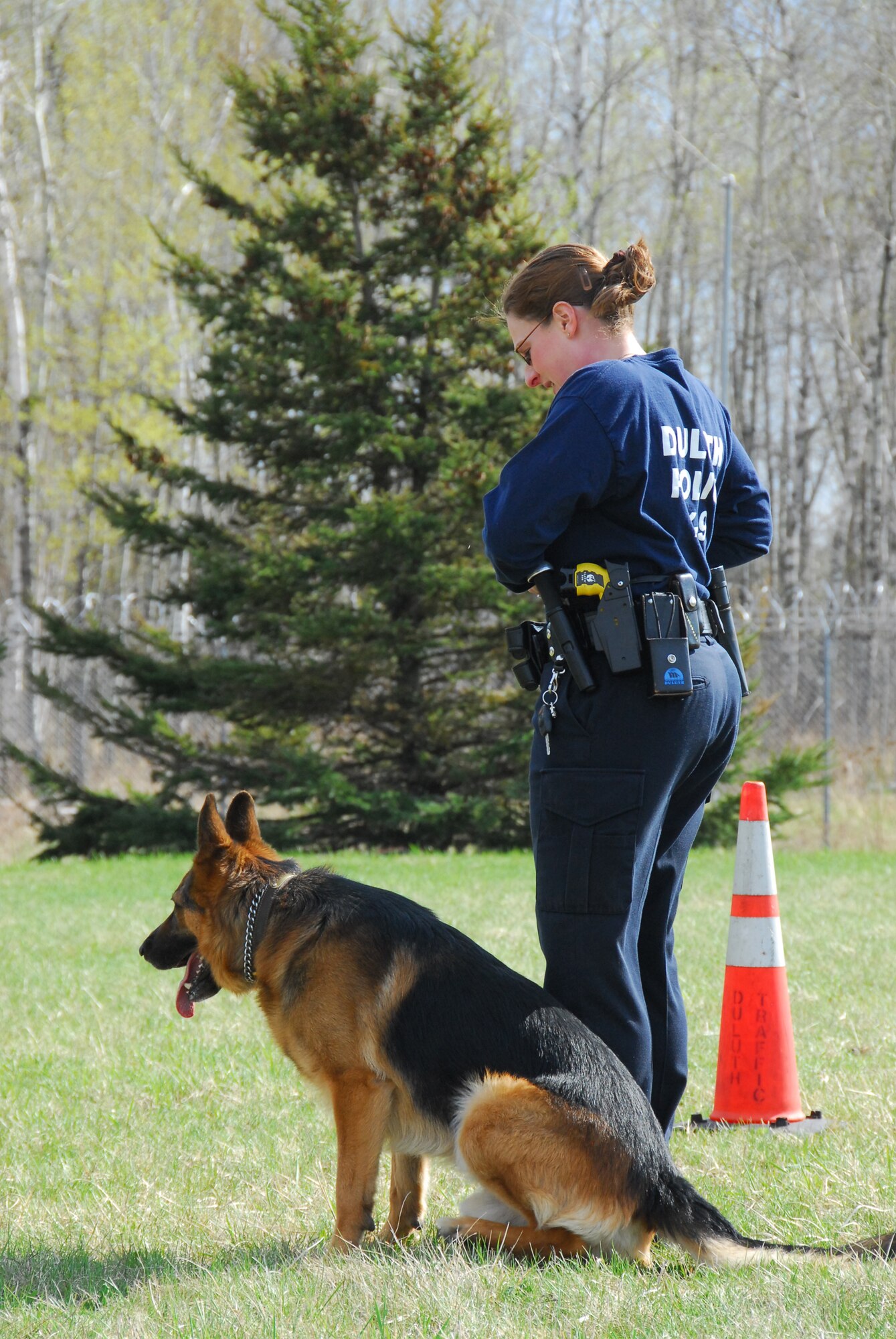 Duluth Police Department K-9 officers conduct training with their dogs at the Air National Guard Base in Duluth, Minn., May 11, 2009.  The 148th Fighter Wing Security Forces has opened their doors to welcome the four-legged guests to the base strengthening the effort of joint training in the community. (U.S. Air Force photo by Tech. Sgt. Brett Ewald) 
