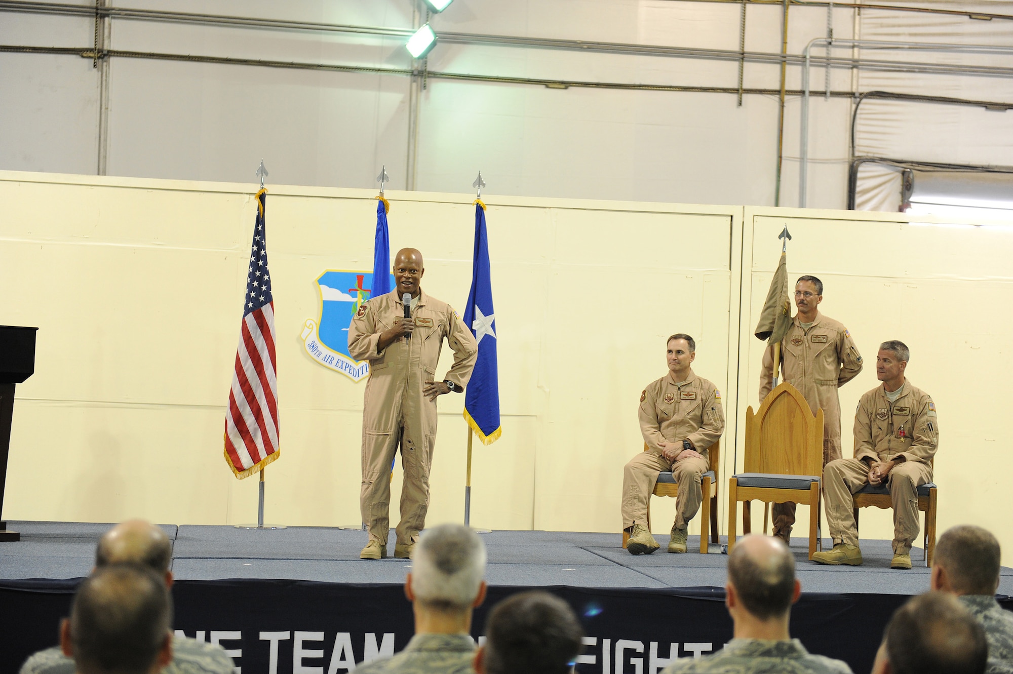 Col. Soren Jones, 380th Expeditionary Operations Group, commander, makes his first speech to 380th EOG and 380th Air Expeditionary Wing personnel after accepting command during a ceremony, May 18 at an undisclosed location in Southwest Asia. Colonel Jones comes from the Air Combat command headquarters at Langley AFB, Va. to lead the 380th EOG. (U.S. Air Force photo by Senior Airman Brian J. Ellis) (Released)