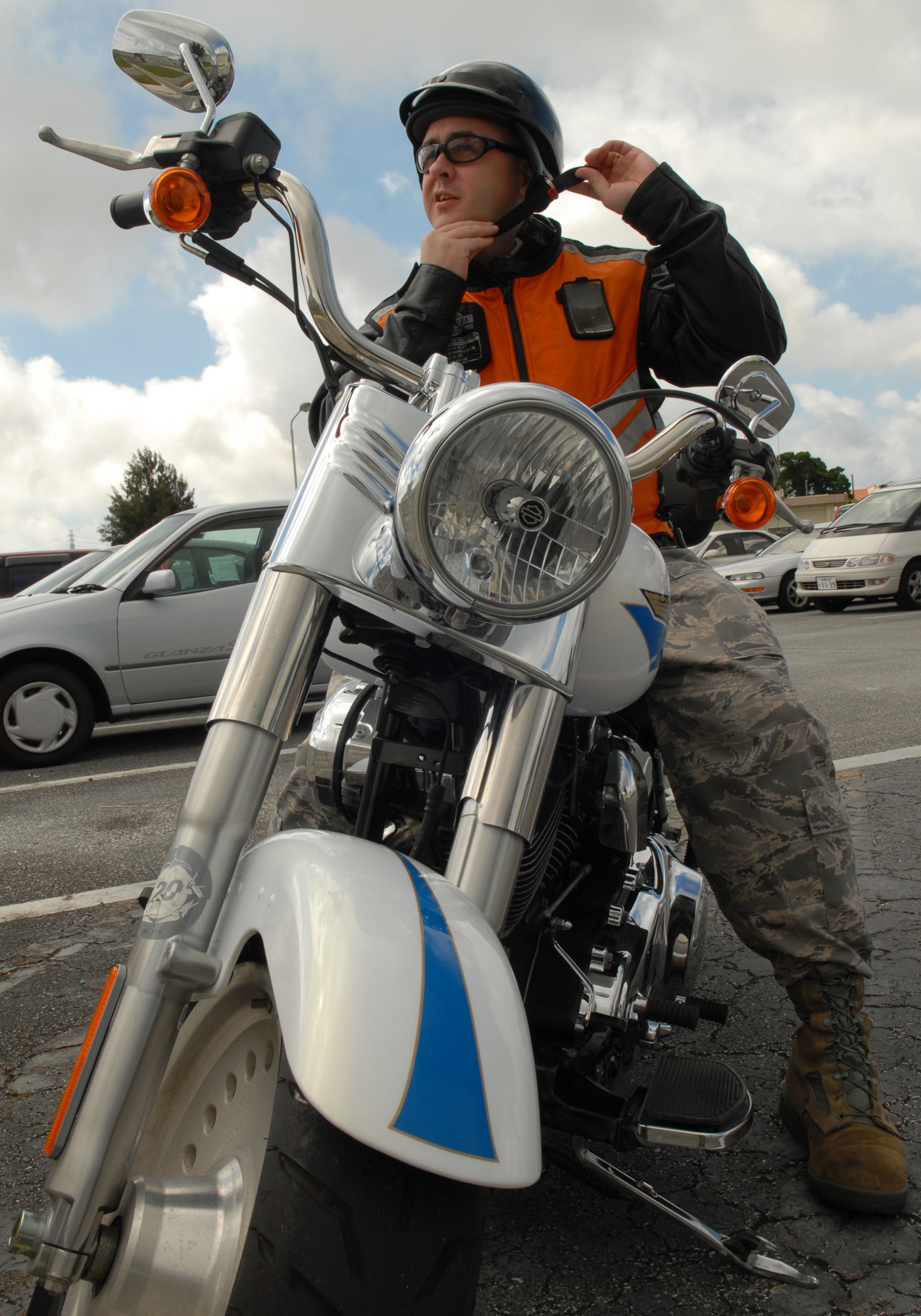 Tech. Sgt. Jason Edwards, the 18th Wing Motorcycle Safety Representative from the Public Affairs Office, demonstrates proper wear of personal protective gear for Motorcycle Safety Day at Kadena Air Base, Japan May 18. 
(U.S. Air Force photo/Tech. Sgt. Angelique Perez) 