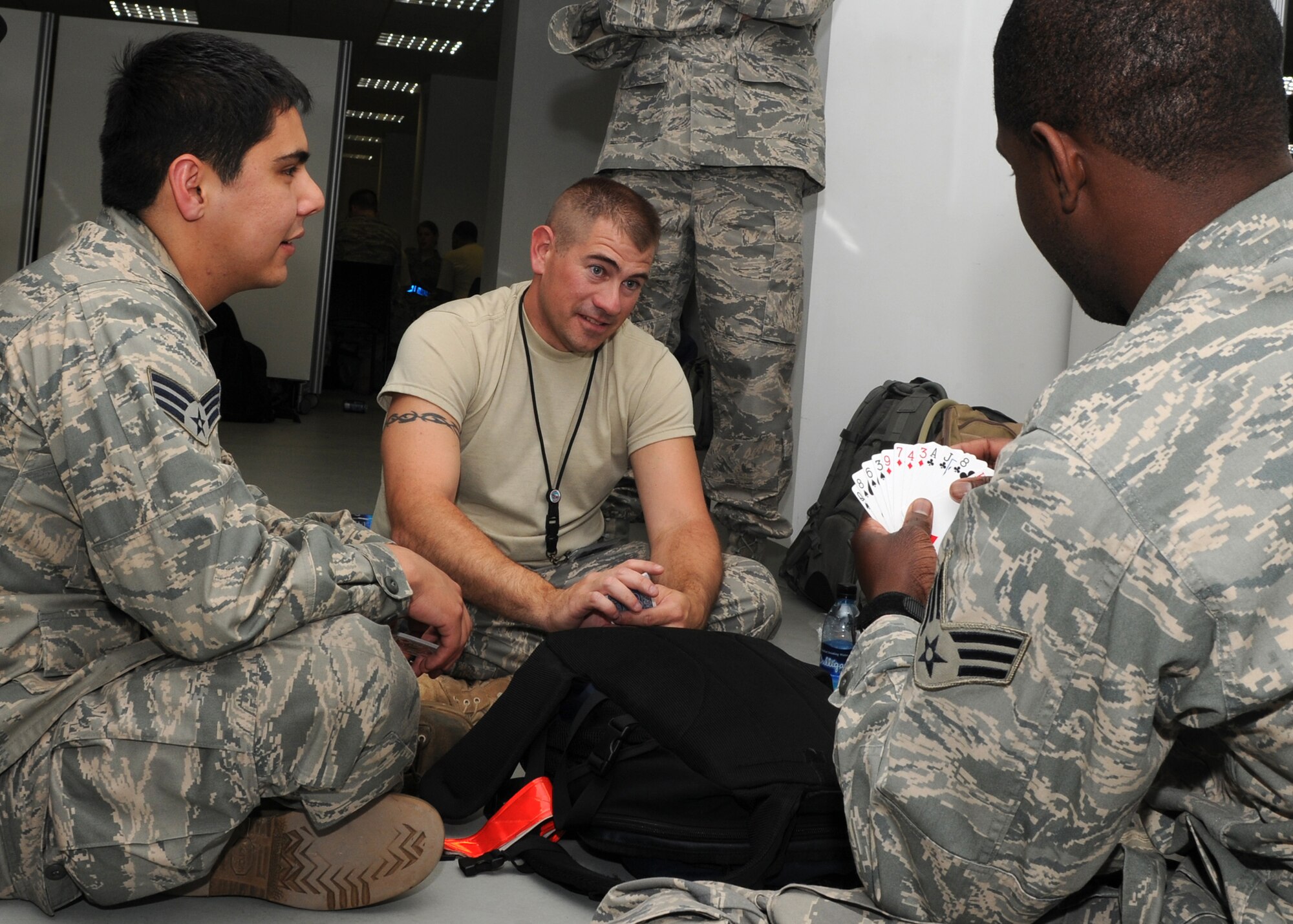 SPANGDAHLEM AIR BASE, Germany -- A group of Sabers enjoy a card game May 19, 2009.  More than 200 members assigned to Spangdahlem Air Base recently deployed to various locations downrange to support overseas contingency operations.   (U.S. Air Force photo by Staff Sgt. Heather M. Norris)