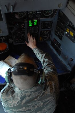 United States Air Force Staff Sgt. Patrick Harrower, 86th Aircraft Maintenance Squadron communication navigation specialist performs a radio check on a C-130 Hercules prior to take off, May 8, 2009, Ramstein Air Base, Germany. (U.S. Air Force photo by Senior Airman Kenny Holston)