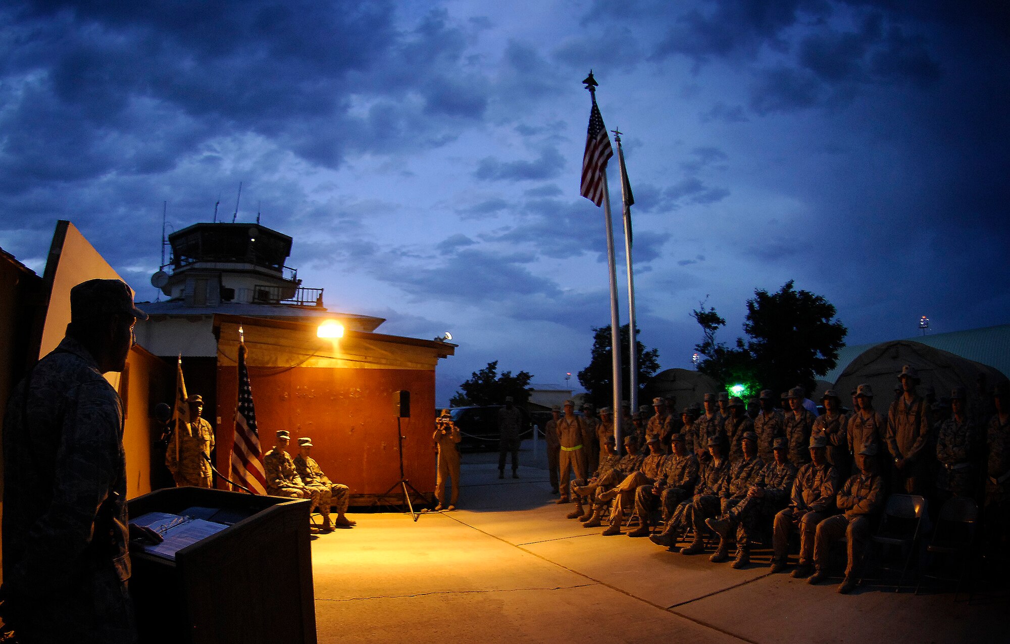 Col. Raymond Strasburger, 455th Expeditionary Operations Group commander, shares his thoughts about Lt. Col. Wayne Straw's one-year tenure as the operations support squadron commander during a change of command ceremony May 20. Colonel Straw relinquished command of the 455th Expeditionary Operations Support Squadron to Lt. Col. Cloyce Adams. (Air Force/Staff Sgt. Jason Lake)