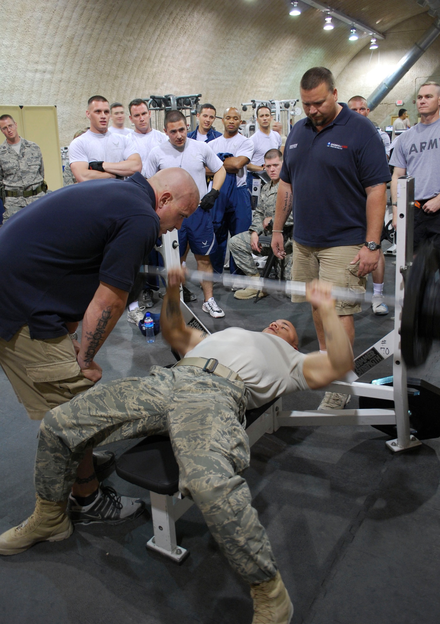 Senior Airman Derrick Tolliver, 455th Expeditionary Security Forces Squadron, bench presses 190 lbs. in "The Rock" gym at Bagram Air Field, Afghanistan, May 15. The 455th Expeditionary Force Support Squadron held a bench press competition open to all members of Bagram, consisting of lifting one's body weight as many times unitl failure. Airman Tolliver placed first in the competition receiving an iPod Shuffle. He is deployed from Wright-Patterson Air Force Base, Ohio and hails from Charleston, W.Va. (U.S. Air Force photo/Senior Airman Erik Cardenas)