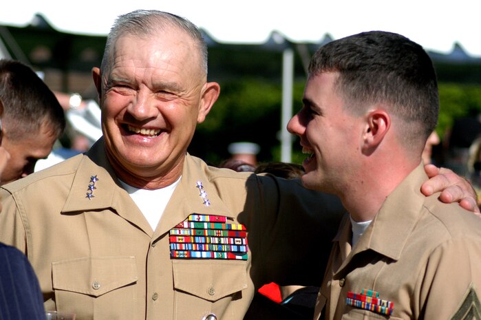 Lt. Gen. Hejlik, II Marine Expeditionary Force commanding general, speaks with Cpl. James McManus, an ammo tech with Special Marine Air Ground Task Force New York, during the mayor's welcome at Gracie Mansion during Fleet Week New York City May 21.(Official Marine Corps photo by Lance Cpl Jad Sleiman)::r::::n::