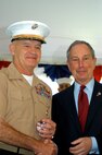 Lt. Gen. Hejlik, II Marine Expeditionary Force commanding general, accepts a crystal apple from New York City Mayor Michael Bloomberg during the mayor's welcome ceremony May 21 at Gracie Mansion.(Official Marine Corps photo by Lance Cpl Jad Sleiman)