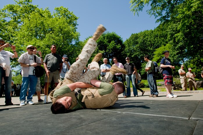 Two Marines square off during a demonstration of Marine Corps Martial Arts during Marine Day in Central Park May 21. This event was just one of many the Marines of 24th Marine Expeditionary Unit and Special Purpose Marine Air Ground Task Force - New York will participate in during Fleet Week. (Official Marine Corps photo by: Cpl. Patrick Fleischman)