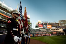 Sgt. Evan Beaule, from Lewiston, Maine, and Cpl. Matthew Burrows, from McMinaville, Tenn., both fire direction and control specialists, and Lance Cpl. Jason Carroll, from Milford, Ma., and Pfc. Jesse Jernigan, from Gates County, N.C., both artillery survey specialists, stand ready to bring the colors on to the field of Yankee Stadium for the playing of the National Anthem May 22. This event was just one of many the Marines of 24th Marine Expeditionary Unit and Special Purpose Marine Air Ground Task Force - New York will participate in during Fleet Week.