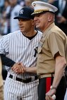 Lt. Gen. Richard F. Natonski, commander for U.S. Marine Corps Forces Command, shakes hand with Joe Girardi, manager for the Yankees. Lt. Gen. Natonski threw out the first pitch of the Yankee and Baltimore Game in Yankee Stadium May 22, 2009. He is in New York City as part of Fleet Week 2009. (Official Marine Corps photo by: Cpl. Patrick Fleischman)
