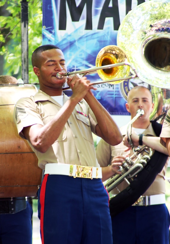 The trombone player with the Marine Jazz Band toots his horn while the band played during Marine Day in Central Park.  Marine Day was one of many events planned through Tuesday as part of Fleet Week 2009.