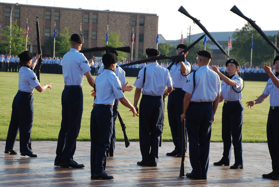 The Royal Blue Knights Drill Team performs at the Armed Forces Parade May 22 at the base parade field. (U.S. Air Force photo/ Airman 1st Class Valerie Hosea)