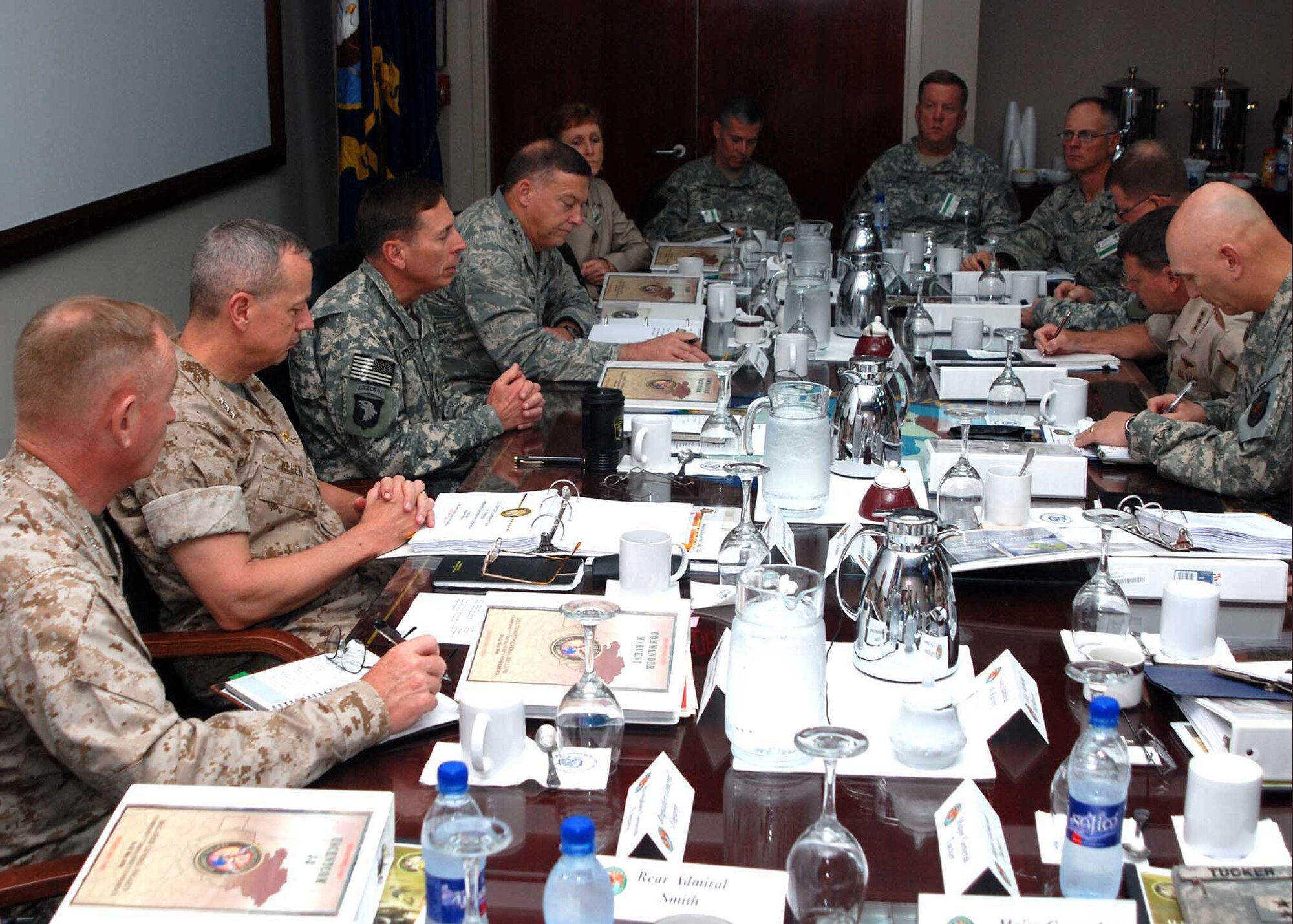 Army Gen. David H. Petraeus (third from left), commander of U.S. Central Command, talks with regional U.S. commanders at a conference in Bahrain May 21. (U.S. Navy photo/Petty officer 2nd Class Nathan Schaeffer) 
