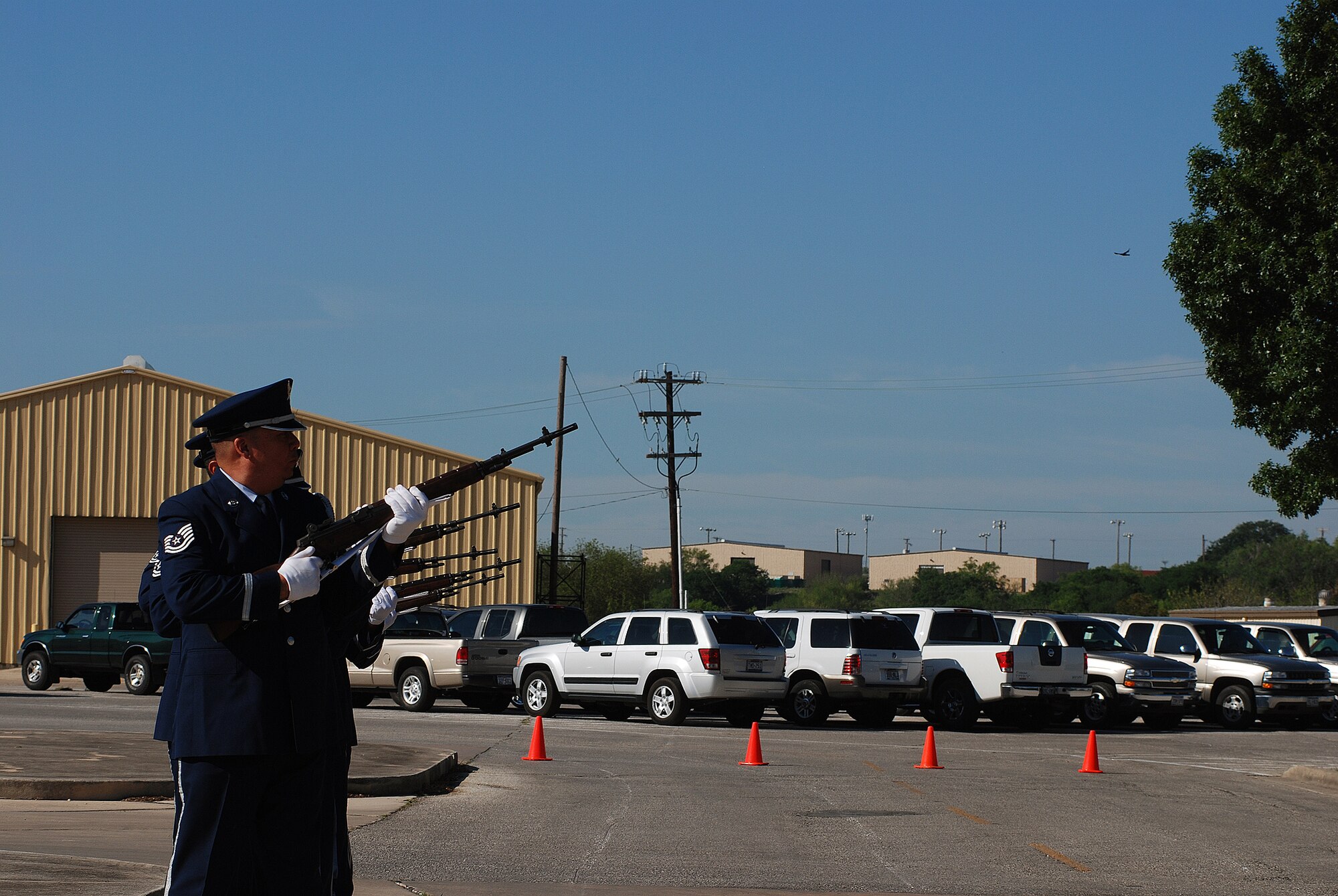 The 433rd Airlift Wing stopped for a Memorial Day ceremony at the Bravo-12 Memorial Grove the Thursday before Memorial Day 2009. Bravo-12 was the call sign for a C-5 that crashed in 1990. The grove, built in memory of the crew, now serves as a memorial to all of the fallen Airmen from the Alamo Wing. (U.S. Air Force Photo/Airman Brian McGloin)