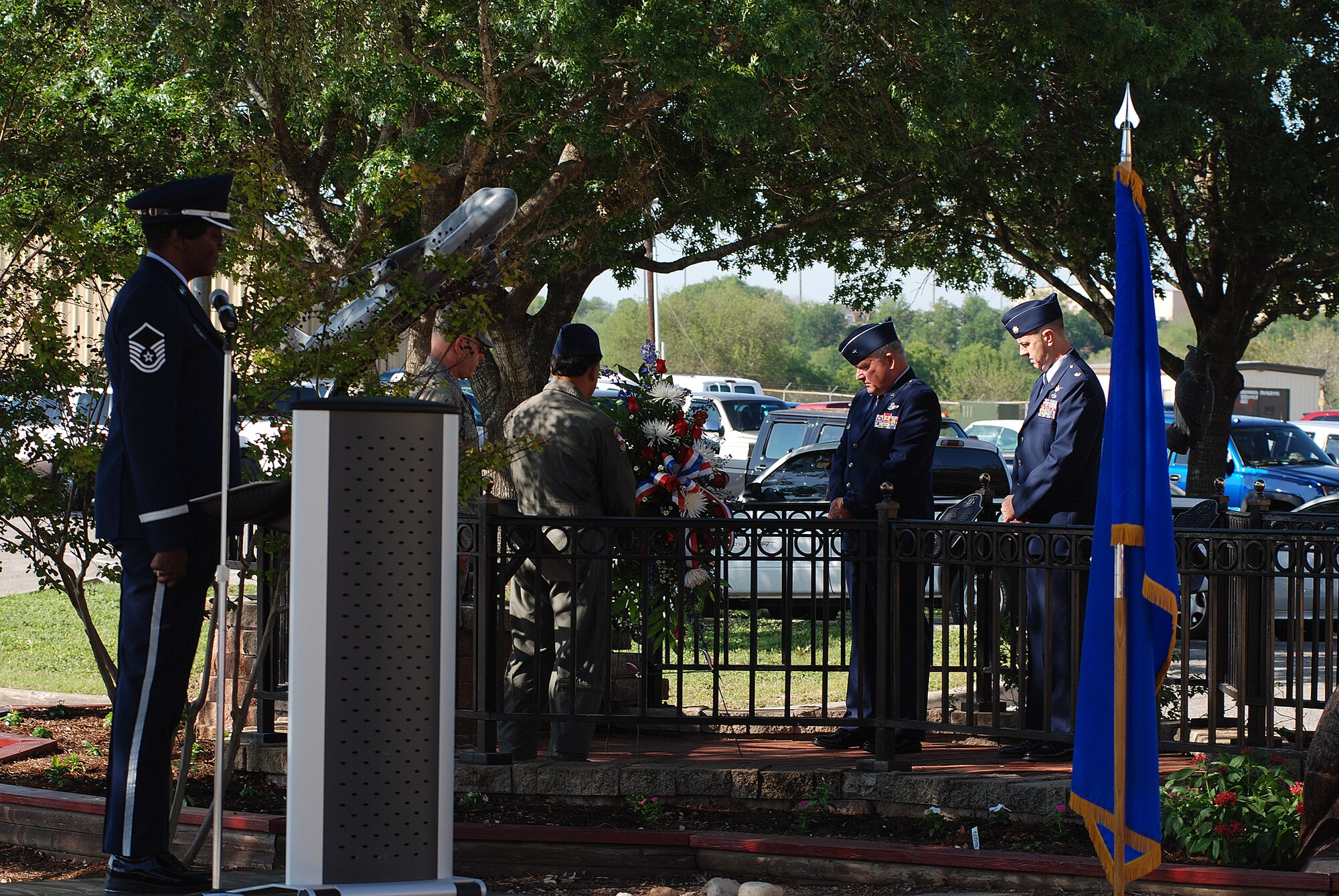 The 433rd Airlift Wing stopped for a Memorial Day ceremony at the Bravo-12 Memorial Grove the Thursday before Memorial Day 2009. Bravo-12 was the call sign for a C-5 that crashed in 1990. The grove, built in memory of the crew, now serves as a memorial to all of the fallen Airmen from the Alamo Wing. (U.S. Air Force Photo/Airman Brian McGloin)