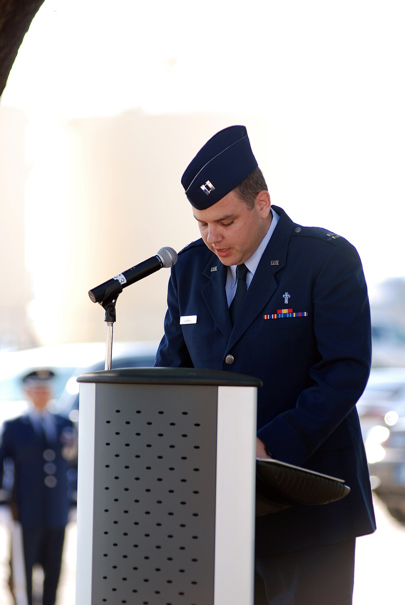 Chaplain Jesse Howard offers the invocation as the 433rd Airlift Wing stopped for a Memorial Day ceremony at the Bravo-12 Memorial Grove the Thursday before Memorial Day 2009. Bravo-12 was the call sign for a C-5 that crashed in 1990. The grove, built in memory of the crew, now serves as a memorial to all of the fallen Airmen from the Alamo Wing. (U.S. Air Force Photo/Airman Brian McGloin)