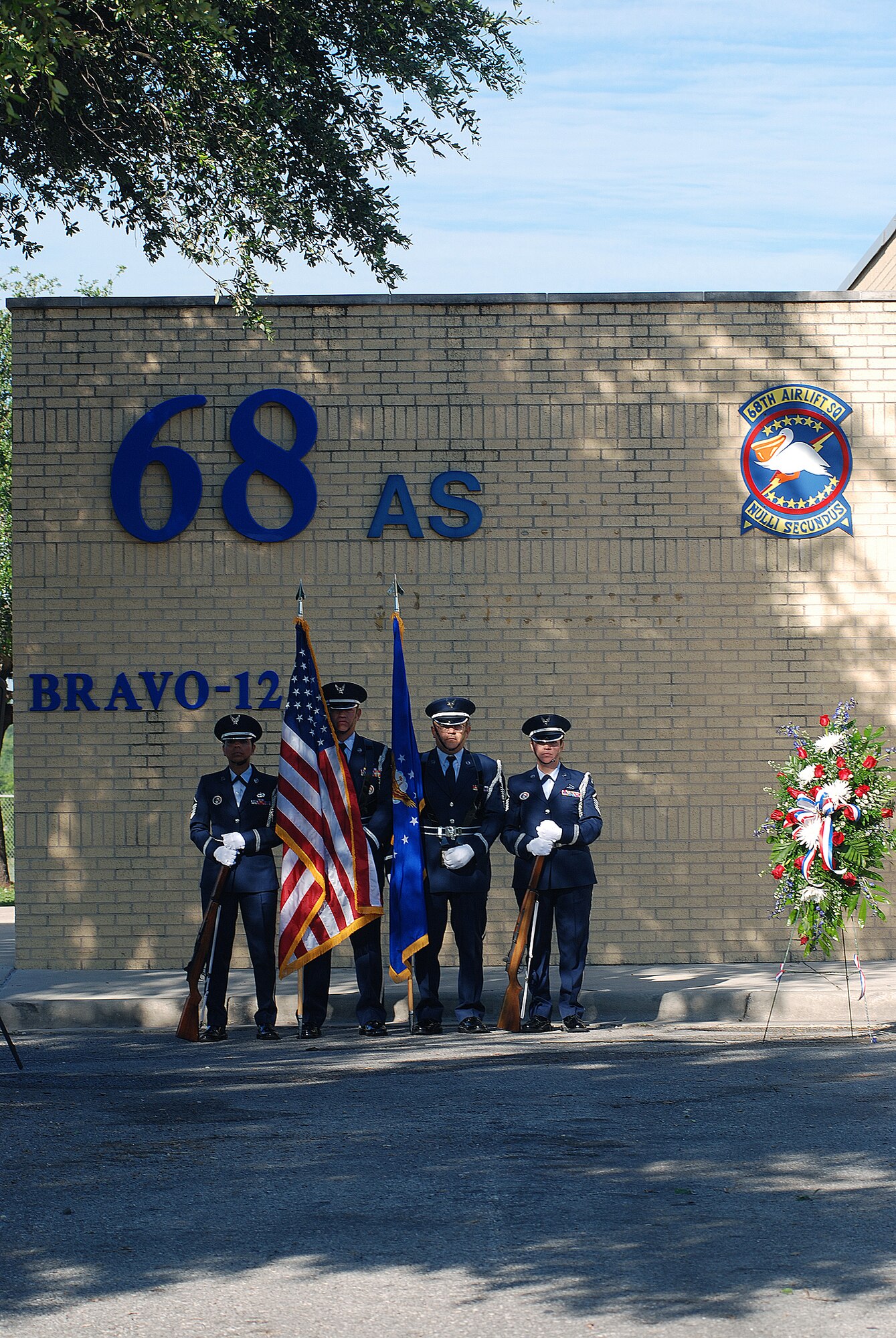 The 433rd Airlift Wing stopped for a Memorial Day ceremony at the Bravo-12 Memorial Grove the Thursday before Memorial Day 2009. Bravo-12 was the call sign for a C-5 that crashed in 1990. The grove, built in memory of the crew, now serves as a memorial to all of the fallen Airmen from the Alamo Wing. (U.S. Air Force Photo/Airman Brian McGloin)