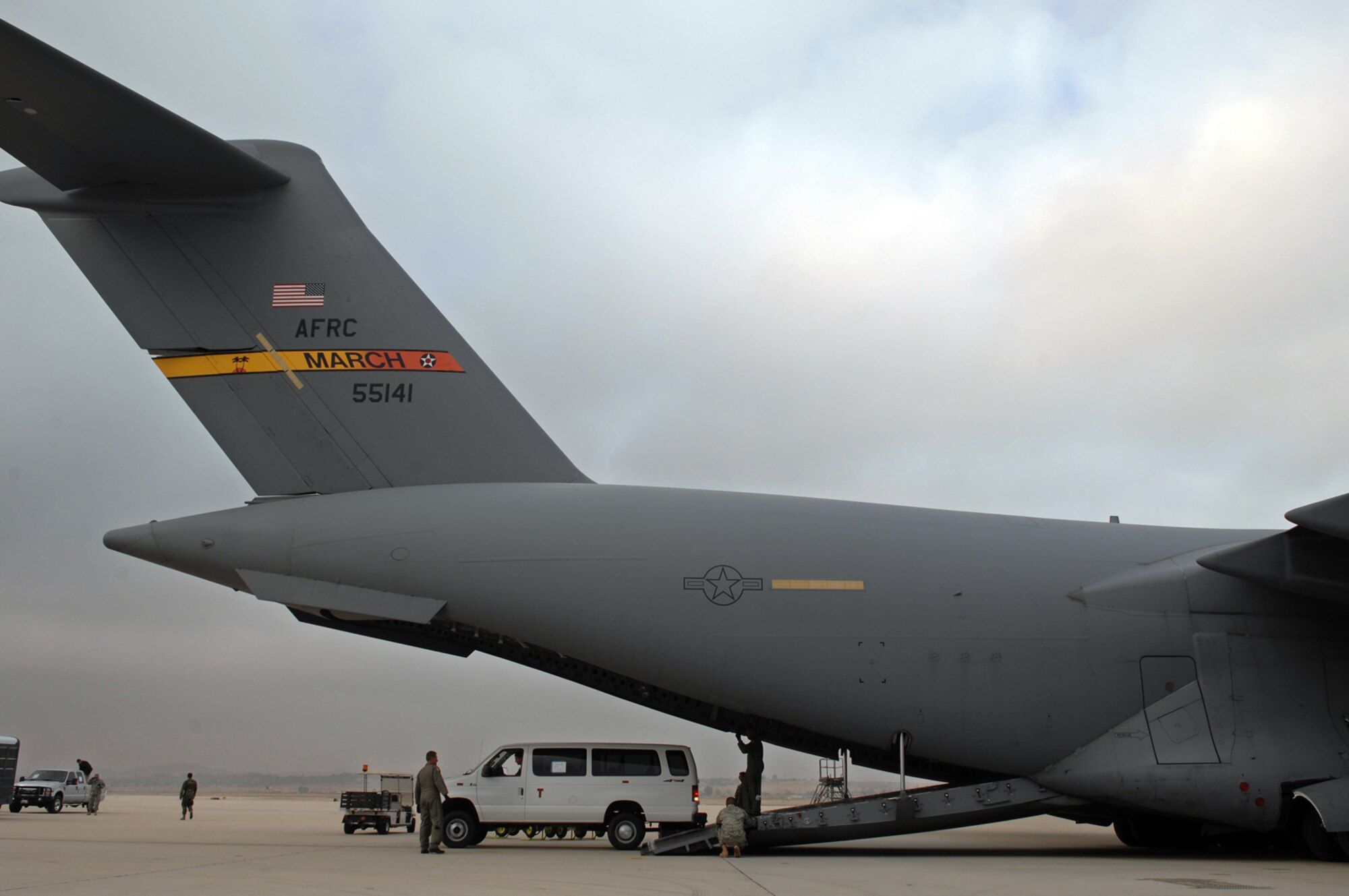 Aircrew members from the 729th Airlift Squadron load an FBI Rapid Deployment Team and their vehicles into a C-17 for exercise Patriot Hoover 2009. Patriot Hoover 2009 is a large scale air mobility exercise involving the Air Force Reserve Command, airlift control flights, aerial port and multiple flying units along with the Puerto Rico Air National Guard. The purpose is to provide air mobility operations training for AFRC’s ALCF, aircrews and aerial ports. FBI Rapid Deployment Teams from Washington, D.C., Miami, New York City and Los Angeles also participated. (U. S. Air Force photo by Master Sgt. Rick Sforza)