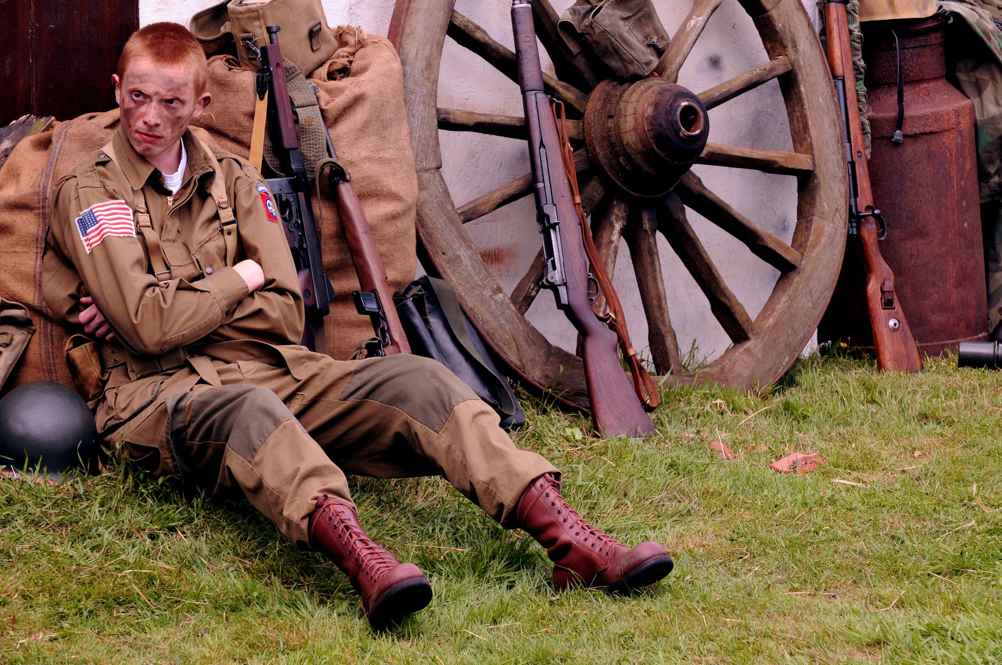 Lewis Brawn, a British citizen, reenacts an 82nd Airborne paratrooper after D-Day June 6, 1944 during the grand opening of the Royal Air Force Horham airfield May 17. The event, which happens annually, holds special meaning to him since his uncle was a bombardier in the 96th Bomb Group, U.S. Army Air Corp during World War II. (U.S. Air Force photo by Staff Sgt. Nathan Gallahan)