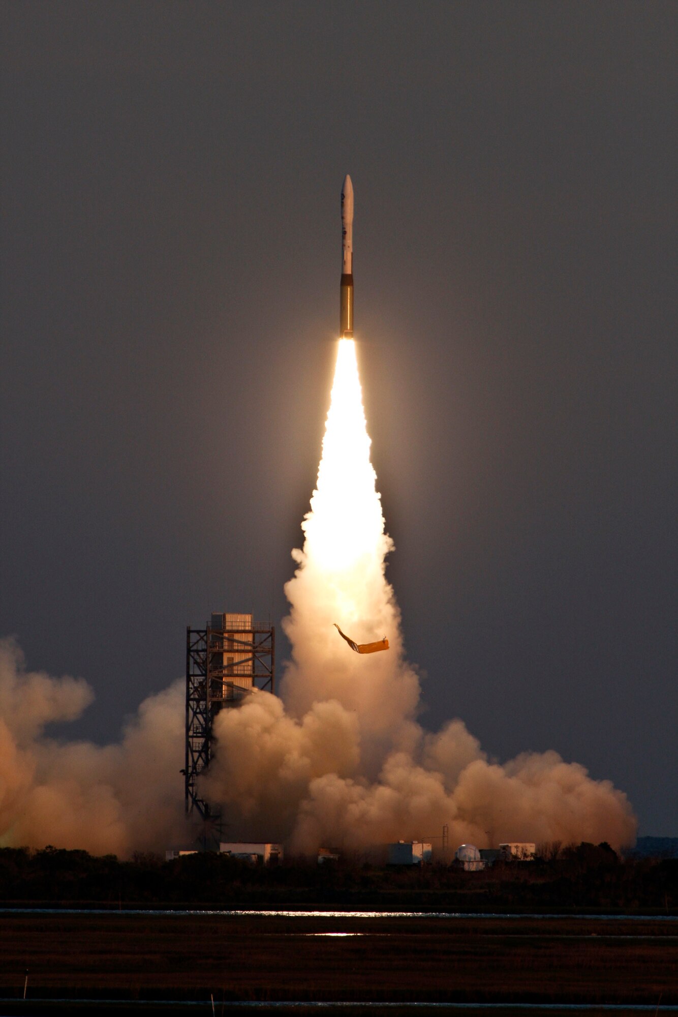 An Air Force Minotaur I rocket launches into orbirt carrying the Air Force Research Laboratory's TacSat-3 satellite, NASA's PharmaSat microsatellite and NASA's CubeSat Technology Demonstration May 19 from Wallops Flight Facility, Va. (Courtesy photo) 
