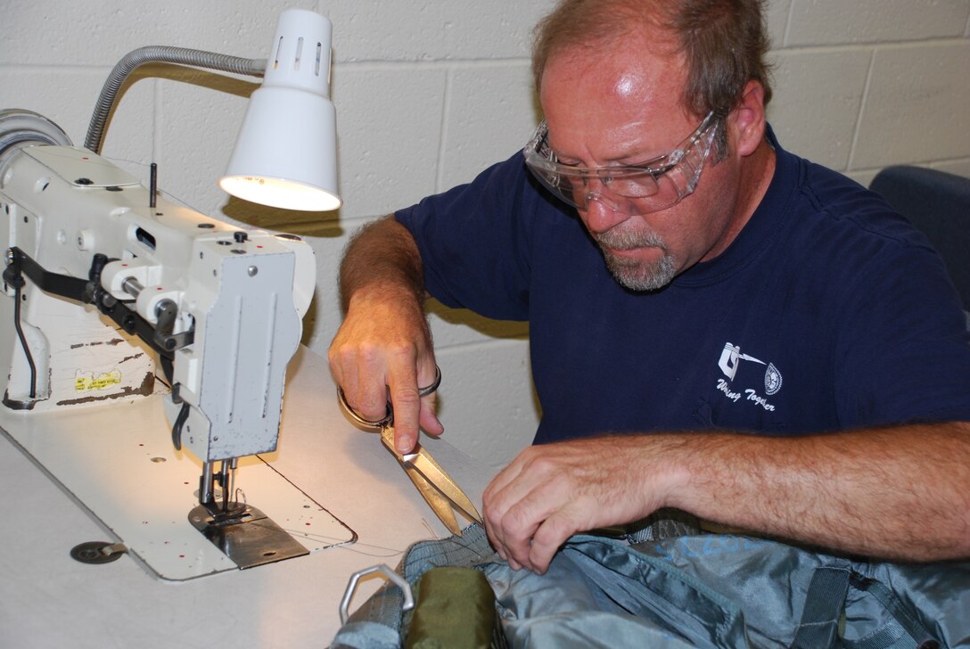 Richard Brown, a Lier Siegler, Inc. contractor with the 80th Flying Training Wing, repairs equipment in the fabrication shop for the Aircrew Flight Equipment shop. (U.S. Air Force photo/ Airman 1st Class Valerie Hosea)
