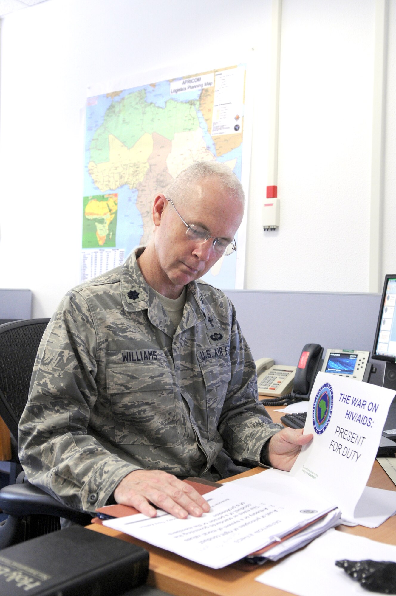 17th Air Force (Air Forces Africa) Command Chaplain (Lt. Col.) Rex Williams prepares material on the Department of Defense HIV/AIDs Prevention Program for U.S. Africa Command Theater Security Engagements. (USAF photo by Master Sgt. Jim Fisher)