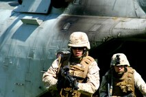 Marines from Special Purpose Marine Ground Task Force New York secure a landing zone during helicopter raid demonstation at Orchard Beach in he Bronx May 22. (Official Marine Corps photo by Lance Cpl. Jad Sleiman)