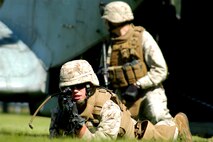 Marines from Special Purpose Marine Ground Task Force New York secure a landing zone during helicopter raid demonstation at Orchard Beach in he Bronx May 22. (Official Marine Corps photo by Lance Cpl. Jad Sleiman)