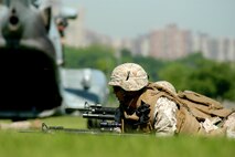 Marines from Special Purpose Marine Ground Task Force New York secure a landing zone during helicopter raid demonstation at Orchard Beach in he Bronx May 22. (Official Marine Corps photo by Lance Cpl. Jad Sleiman)