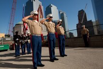 Gunnery Sgt. Justin Smith, from Cape Code, Ma., and platoon sergeant for 3rd platoon, Company C, 2nd Amphibian Assault Battalion, 2nd Marine Expeditionary Force, Staff Sgt. Deryck Smith, from Jacksonville, Fla. and substance abuse control officer for Headquarters and Support Company, 2nd Tank Battalion, 2nd MEF, and Staff Sgt. Jonathan Novak, from Villa Park, Ill., and section leader for 3rd platoon, Co. C, 2nd AA Bn., 2nd MEF, reenlist at the construction site of the Freedom Town in lower Manhattan, May 22. The Marines requested, and waited, to conduct the ceremony at the site of what was the World Trade Center. Lt. Gen. Richard F. Natonski, commander for U.S. Marine Corps Forces Command,  reenlisted the Marines as part of his during Fleet Week 2009. (Official Marine Corps photo by: Cpl. Patrick Fleischman)