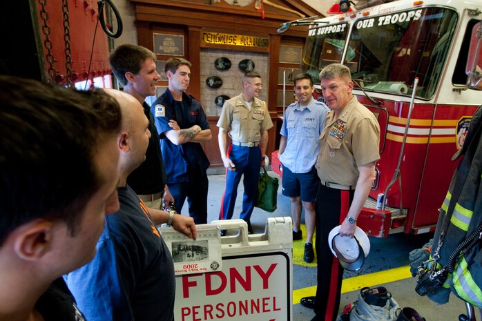 Following a reenlistment ceremony at Ground Zero, Lt. Gen. Richard F. Natonski, commander for U.S. Marine Corps Forces Command, visited Ladder 10, located directly across the street from the World Trade Center site, to speak with New York City Fire Department fire fighters, May 10. (Official Marine Corps photo by: Cpl. Patrick Fleischman)
