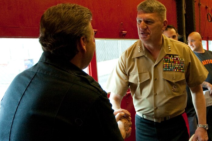 Following a reenlistment ceremony at Ground Zero, Lt. Gen. Richard F. Natonski, commander for U.S. Marine Corps Forces Command, visited Ladder 10, located directly across the street from the World Trade Center site, to speak with New York City Fire Department fire fighters, May 10. (Official Marine Corps photo by: Cpl. Patrick Fleischman)