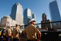 Marines part of Fleet Week 2009 look out and survey the construction of the Freedom Tower at what was the World Trade Center prior to a reenlistment ceremony, May 22. This event was just one of many the Special Purpose Marine Air Ground Task Force - New York will participate in during Fleet Week. (Official Marine Corps photo by: Cpl. Patrick Fleischman)