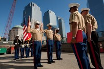 Gunnery Sgt. Justin Smith, from Cape Code, Ma., and platoon sergeant for 3rd platoon, Company C, 2nd Amphibian Assault Battalion, 2nd Marine Expeditionary Force, Staff Sgt. Deryck Smith, from Jacksonville, Fla. and substance abuse control officer for Headquarters and Support Company, 2nd Tank Battalion, 2nd MEF, and Staff Sgt. Jonathan Novak, from Villa Park, Ill., and section leader for 3rd platoon, Company C, 2nd AA Bn., 2nd MEF, reenlist at the construction site of the Freedom Town in lower Manhattan, May 22. Lt. Gen. Richard F. Natonski, commander for U.S. Marine Corps Forces Command, reenlisted the Marines during Fleet Week 2009.