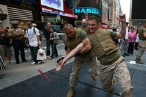 Marines from Special Purpose Marine Air Ground Task Force New York demonstrate the Marine Corp Martial Arts Program (MCMAP) as part of Marine Day in Times Square. The Marines developed a martial arts discipline by mixing together most of today's popular fighting techniques. (Official Marine Corps photo by Sgt. Steve Cushman)