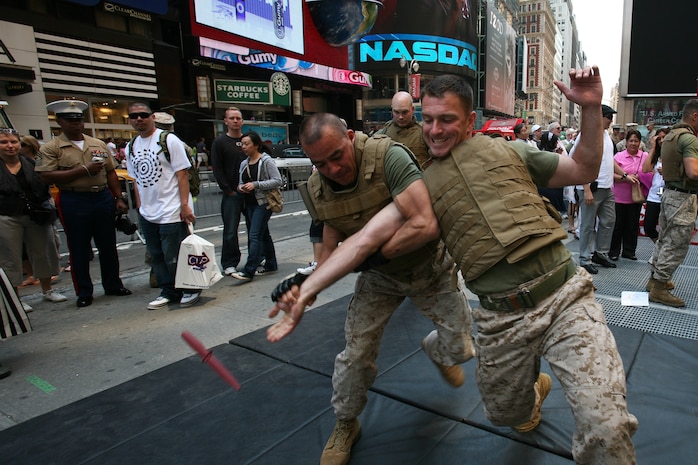 Marines from Special Purpose Marine Air Ground Task Force New York demonstrate the Marine Corp Martial Arts Program (MCMAP) as part of Marine Day in Times Square. The Marines developed a martial arts discipline by mixing together most of today's popular fighting techniques. (Official Marine Corps photo by Sgt. Steve Cushman)