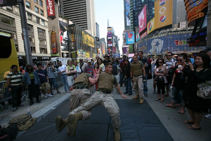 Marines from Special Purpose Marine Air Ground Task Force New York demonstrate the Marine Corp Martial Arts Program (MCMAP) as part of Marine Day in Times Square. The Marines developed a martial arts discipline by mixing together most of today's popular fighting techniques. (Official Marine Corps photo by Sgt. Steve Cushman)