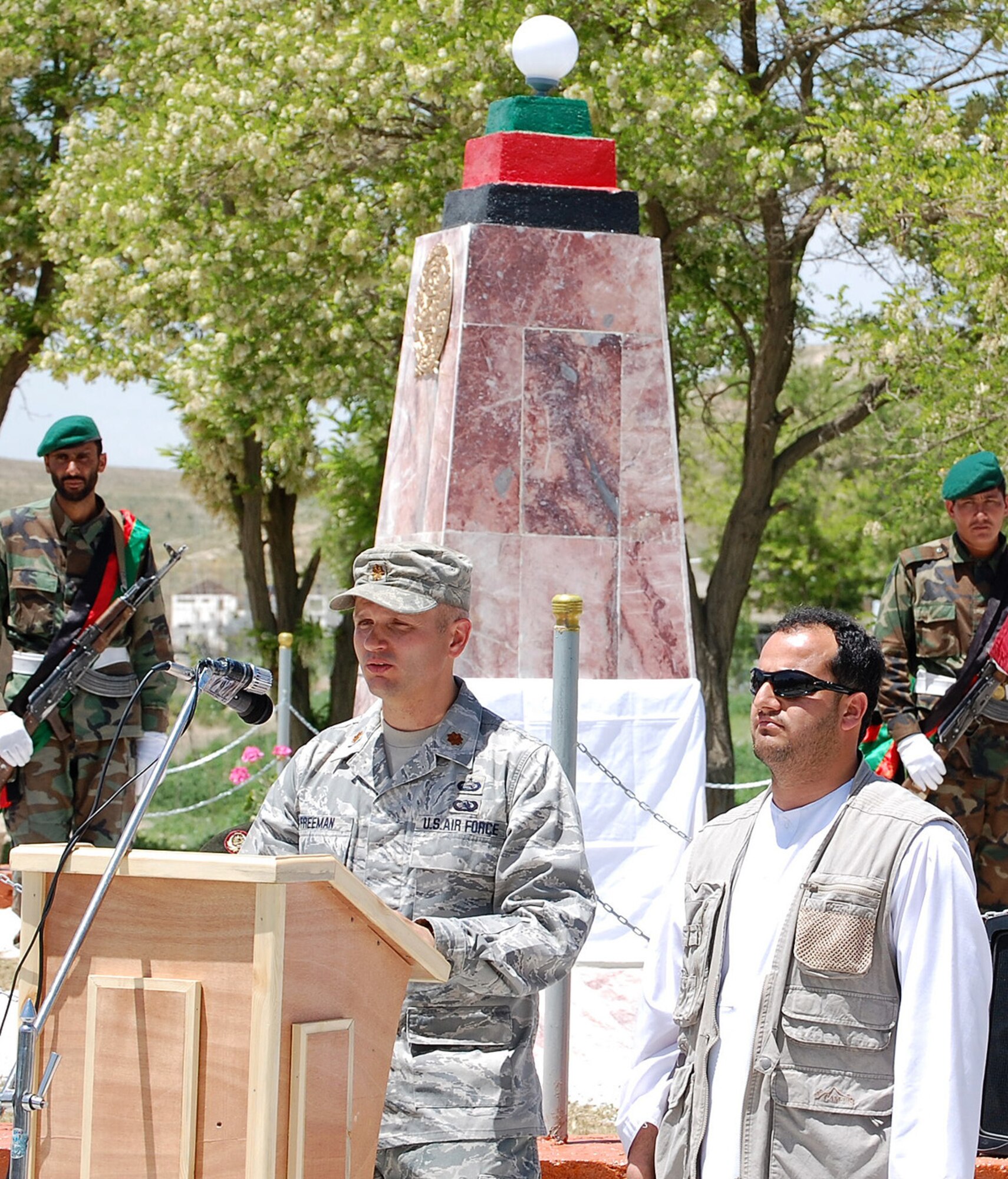 Air Force Maj. Brian Freeman, embedded training team chief for more than 20 Airmen, Soldiers and Sailors embedded with the 5th Kandak (Battalion) talks about the bond shared between his team and the Afghan National Army unit. More than 250 U.S. servicemembers and Afghan security forces celebrated seven years of military cooperation - including 18 Airmen who have provided combat support and counter-insurgency training to more than 430 Afghan soldiers within the Afghan National Army in the last year. (Air Force courtesy photo)