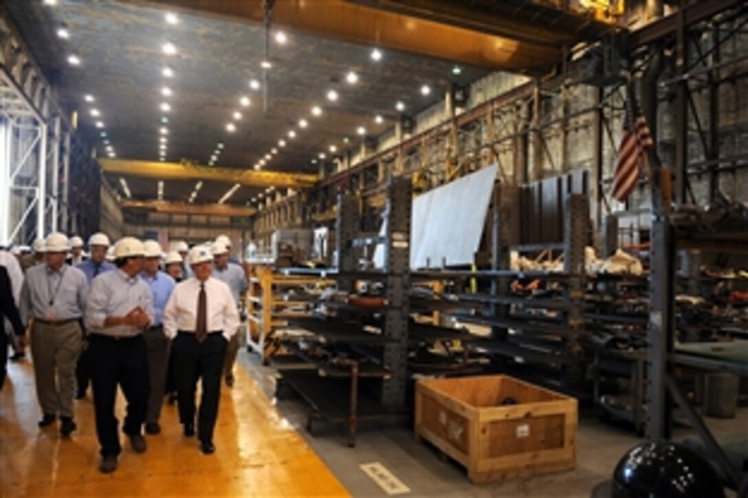 U.S. Defense Secretary Robert M. Gates tours Bath Iron Works, a General Dynamics shipbuilding plant in Bath, Maine,  May 22, 2009.