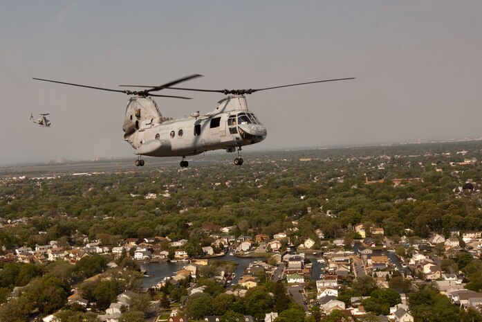 A CH-46E Sea Knight carrying Marines from 2nd Battalion, 6th Marine Regiment with Special Purpose Marine Air Ground Task Force New York, led by 24th Marine Expeditionary Unit, is traveling to a simulated raid of Eisenhower Park in Long Island, N.Y.,  May 23. The event allowed area residents to walk through helicopters and view static displays of weapons. The 24th MEU has more than 900 Marines who are slated to showcase several events for New York's Fleet Week 2009. (Official Marine Corps photo by: Cpl. Patrick Fleischman)