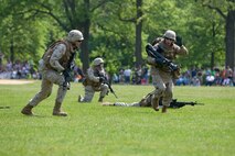 Marines from 2nd Battalion, 6th Marine Regiment with Special Purpose Marine Air Ground Task Force New York, led by 24th Marine Expeditionary Unit, conduct a simulated raid of Clove Lakes Park in Staten Island, N.Y.,  May 23. The event allowed area residents to walk through helicopters and view static displays of weapons. The 24th MEU has more than 900 Marines who are slated to showcase several events for New York's Fleet Week 2009. (Official Marine Corps photo by: Cpl. Patrick Fleischman)