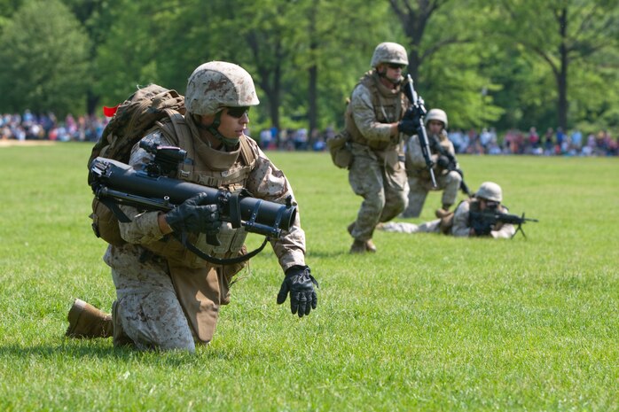 Marines from 2nd Battalion, 6th Marine Regiment with Special Purpose Marine Air Ground Task Force New York, led by 24th Marine Expeditionary Unit, conduct a simulated raid of Clove Lakes Park in Staten Island, N.Y.,  May 23. The event allowed area residents to walk through helicopters and view static displays of weapons. The 24th MEU has more than 900 Marines who are slated to showcase several events for New York's Fleet Week 2009. (Official Marine Corps photo by: Cpl. Patrick Fleischman)