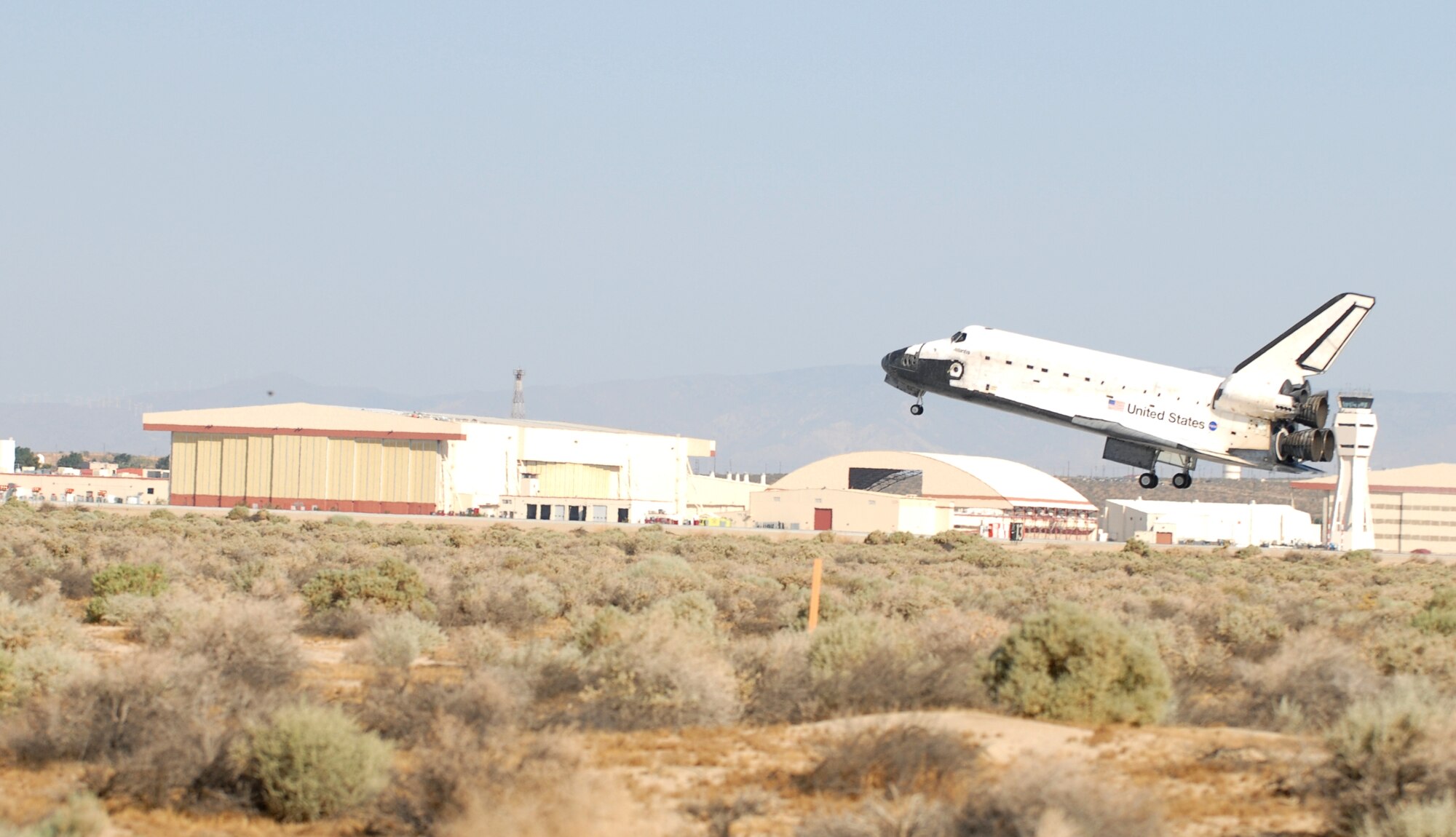 Space shuttle STS-125 Atlantis lands at Edwards May 24 after completing a 13-day journey of approximately 5.3 million miles in space. The Atlantis crew performed five spacewalks on five consecutive days to repair and upgrade the Hubble Space Telescope. In preperation for this, Edwards is required to undergo two exercises a year by Human Space Flight to ensure the base's capabilities to support a shuttle landing meets NASA's standards. (U.S. Air Force photo/Senior Airman Julius Delos Reyes)